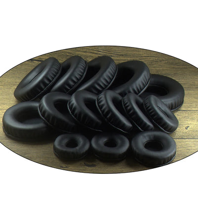 Replacement round ear pads in various sizes for headphones, made of leather, ideal for repair and comfort.
