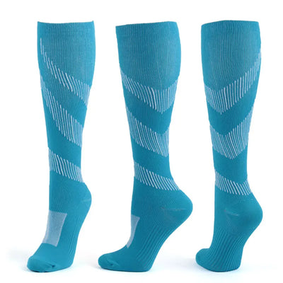 Turquoise compression socks designed for varicose veins, suitable for sports, cycling, and daily wear.