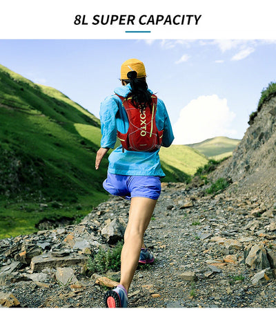 Person running in an 8L capacity hydration vest backpack on a rocky trail, suitable for outdoor activities.