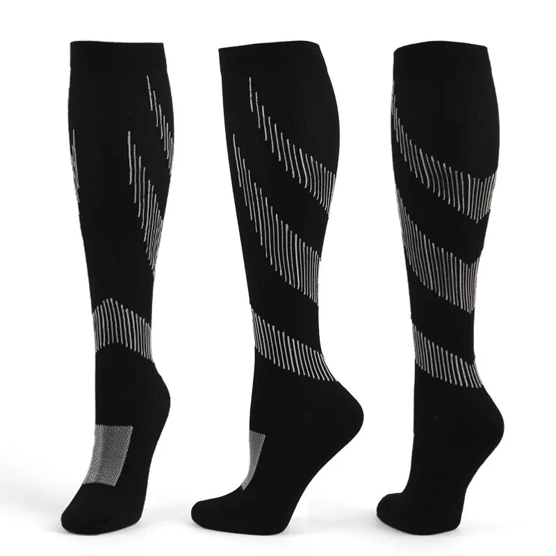 Black compression socks with geometric design for men and women, ideal for sports, running, and varicose vein relief.