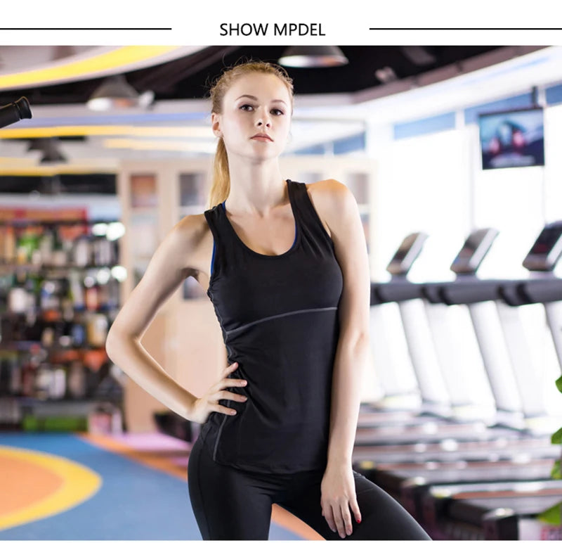 Woman wearing a black sleeveless quick-dry yoga tank top in a gym setting, perfect for workouts and running.