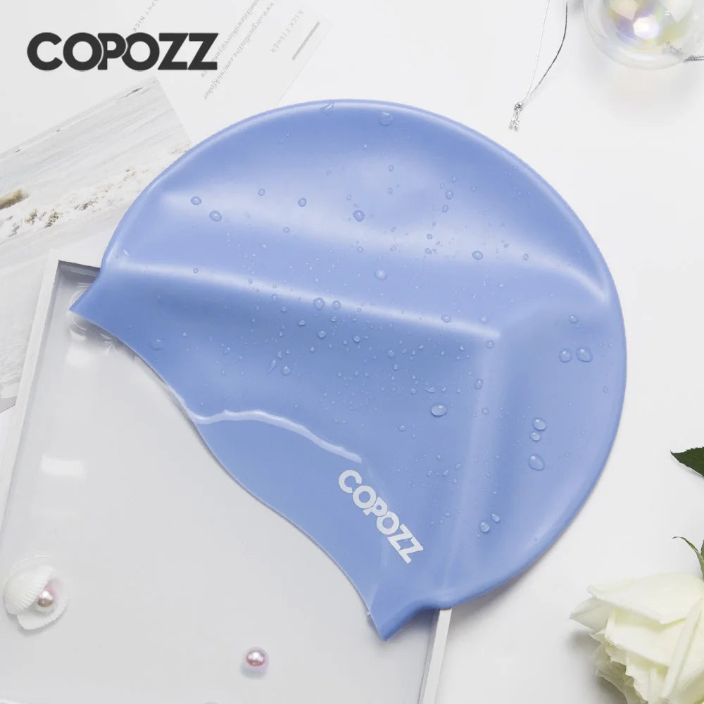 https://freeunderwater.com › products › copozz-men-women-elastic-large-size-candy-color-swimming-wear-hat-adults-waterproof-swimming-hat-silicone-swimming-caps-badmuts