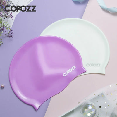 https://freeunderwater.com › products › copozz-men-women-elastic-large-size-candy-color-swimming-wear-hat-adults-waterproof-swimming-hat-silicone-swimming-caps-badmuts