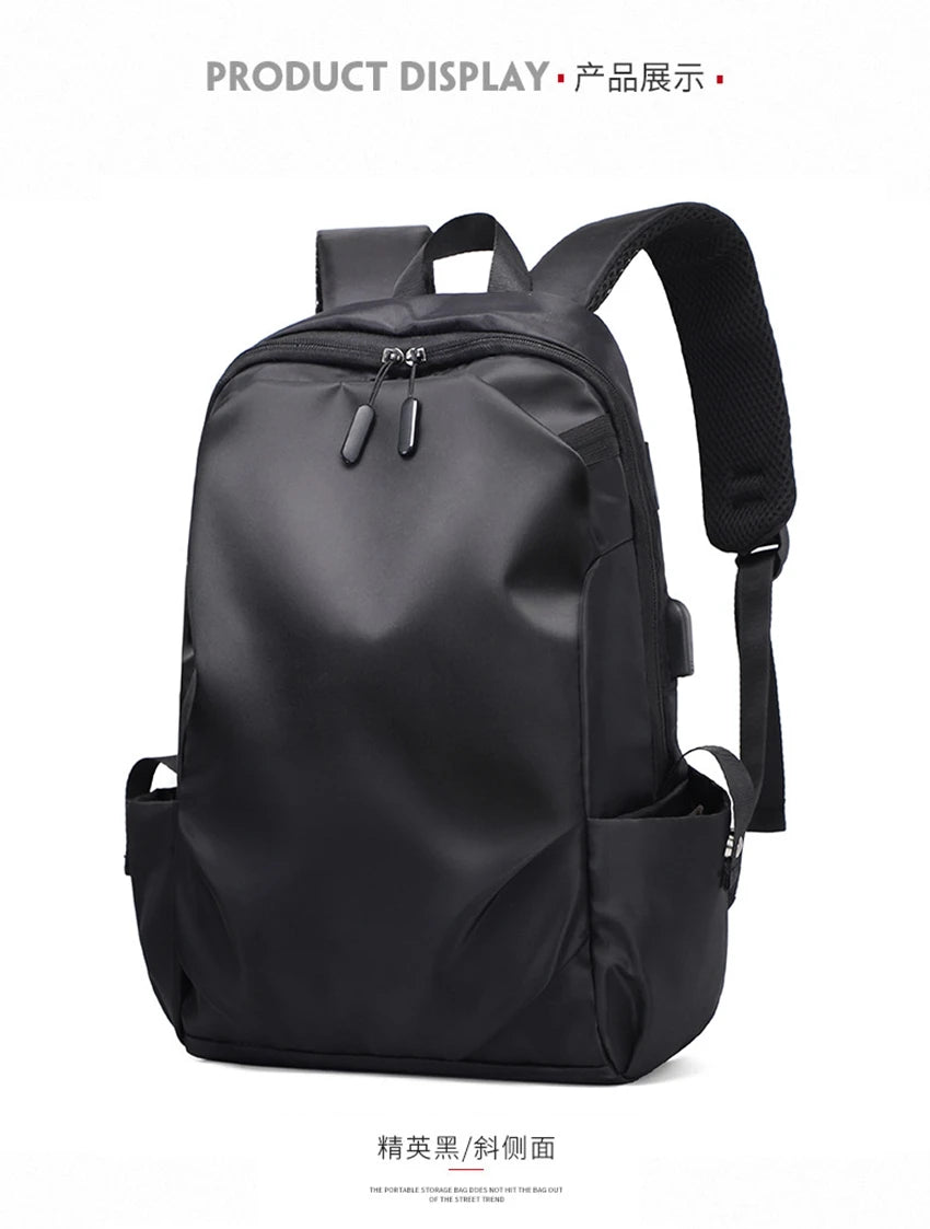 Black unisex backpack with soft straps, zipper closure, and minimal design, ideal for college students and teens.