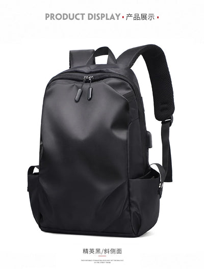 Black unisex backpack with soft straps, zipper closure, and minimal design, ideal for college students and teens.