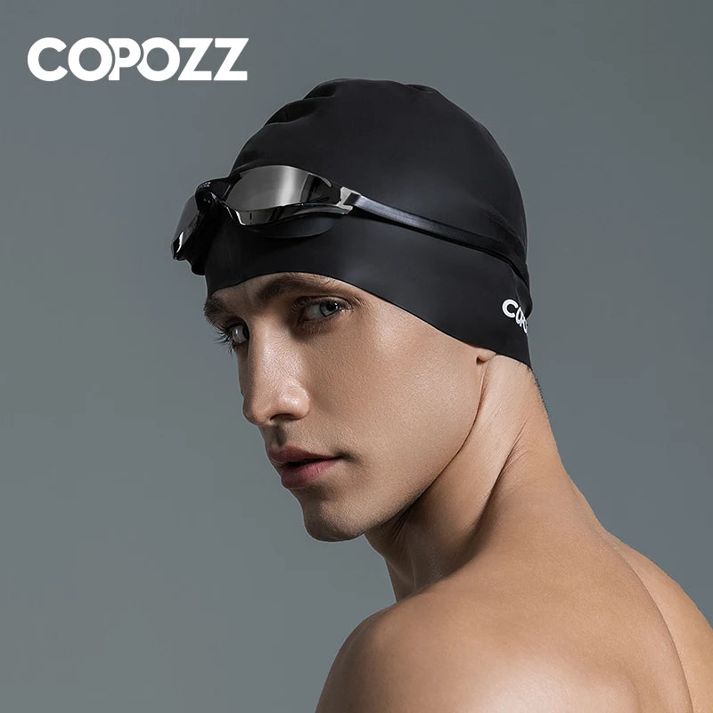 https://freeunderwater.com › products › copozz-men-women-elastic-large-size-candy-color-swimming-wear-hat-adults-waterproof-swimming-hat-silicone-swimming-caps-badmuts