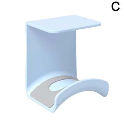 Universal headphone stand with adhesive wall mount, designed for under desk headset storage and gaming earphone organization.