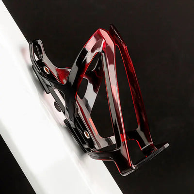 Lightweight colorful bicycle bottle cage in black and red, designed for secure water bottle holding on bike frames.