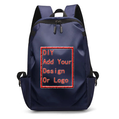 Customizable navy blue backpack with 'DIY Add Your Design Or Logo' print, perfect for personalization.