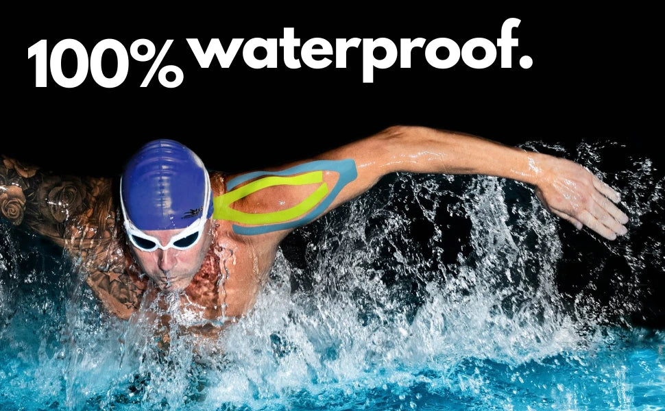 Male swimmer demonstrating 100% waterproof gear with splashes of water around him.