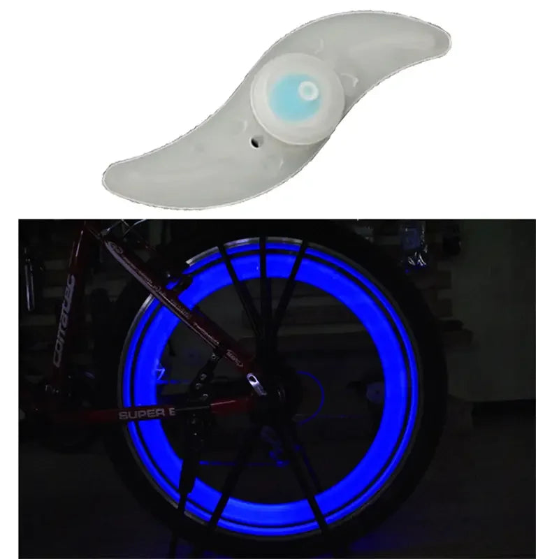 LED bicycle spoke light with blue illumination on a bike wheel, showcasing waterproof design and multiple modes for safety.