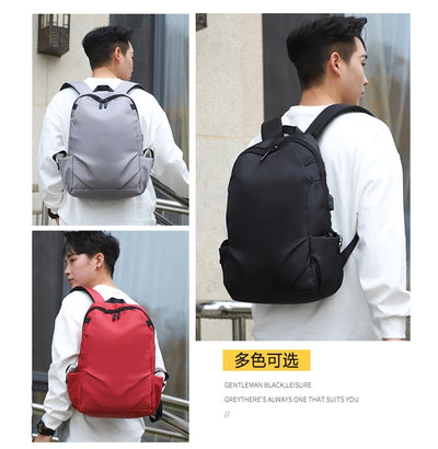Football Super Stars backpack in black, gray, and red, ideal for students, featuring USB port and stylish design.