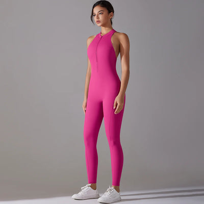 Pink women’s bodysuit featuring a zip front, designed for yoga and fitness, made from breathable material.