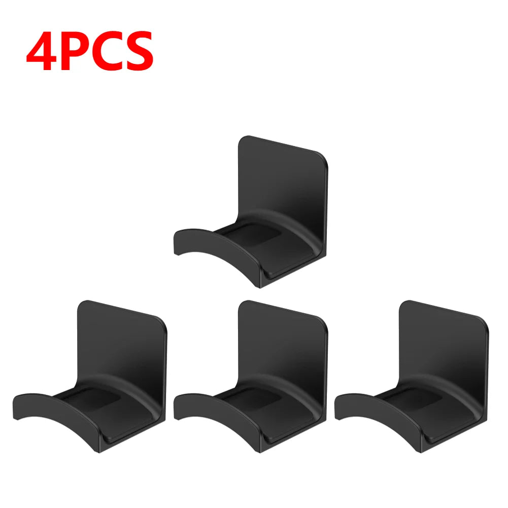 Set of 4 universal adhesive headphone hangers for wall or desk mounting, ideal for organizing headphones.