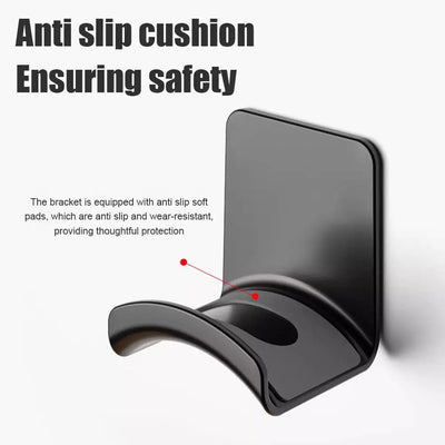 Black headphone stand with anti-slip cushion for safety and protection, ideal for wall mounting and organizing headsets.