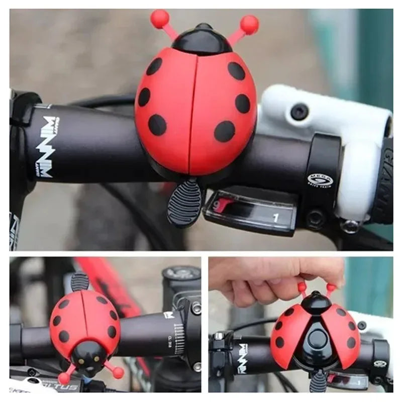 Cute cartoon ladybug bike bell for kids, featuring a vibrant red and black design, perfect for mini bicycles.