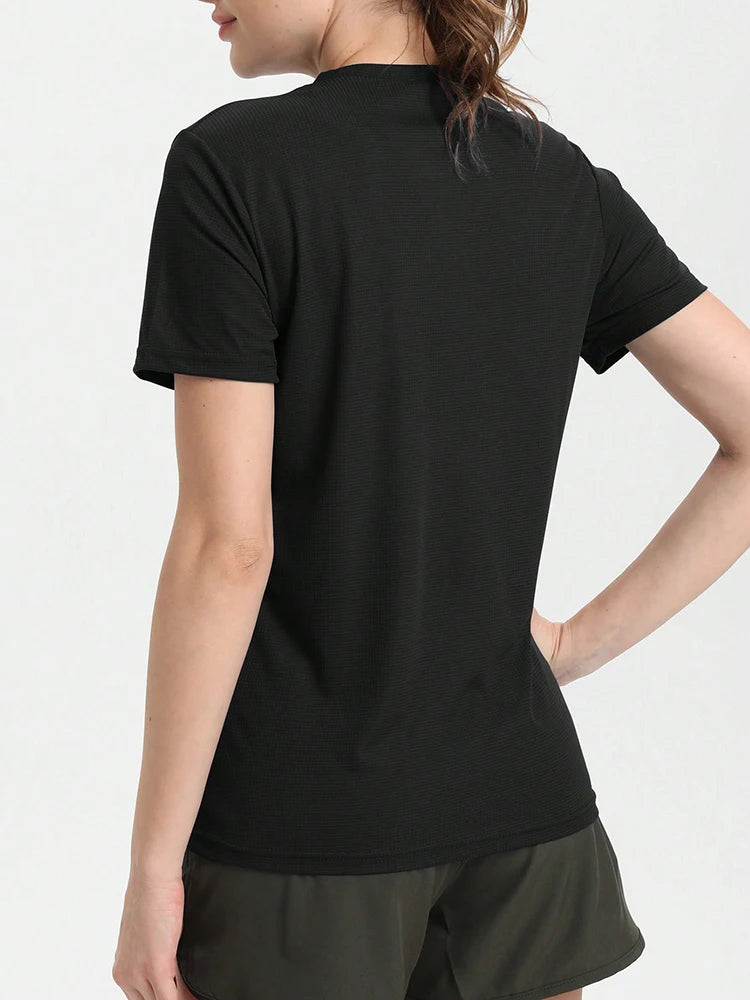 Back view of Women's Solid Color Ultralight Quick Dry Sport T-Shirt, breathable and lightweight for running and gym activities.