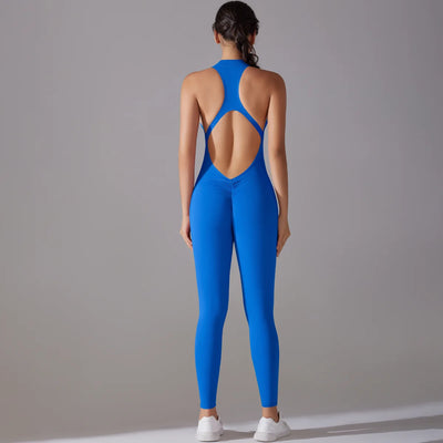 Back view of a woman in a blue tummy control bodysuit perfect for yoga and workouts.