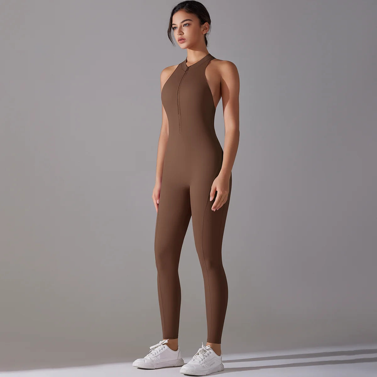Women's brown bodysuit designed for tummy control and butt lifting, perfect for fitness and yoga workouts.