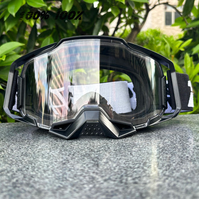 100% IOOX Motorcycle goggles with clear lens for off-road MTB dirt bike racing, designed for unisex wear and maximum protection.