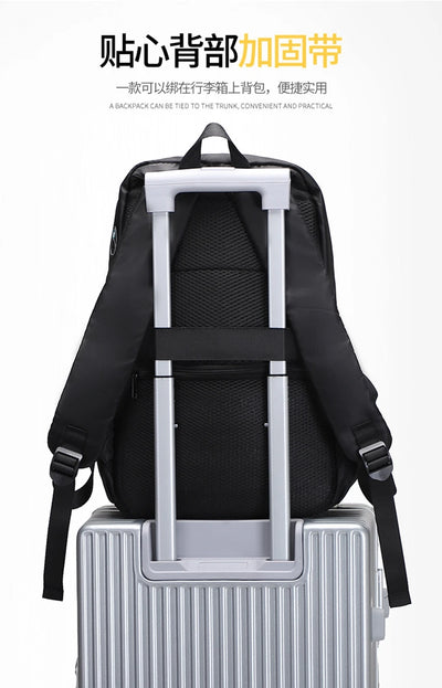 Black backpack secured on a luggage handle, showcasing practical travel design and functionality.
