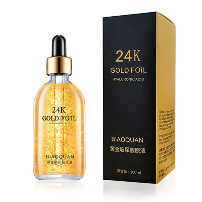 24K Gold Foil Hyaluronic Acid Face Serum in a glass dropper bottle with luxurious packaging for hydration and skin rejuvenation.