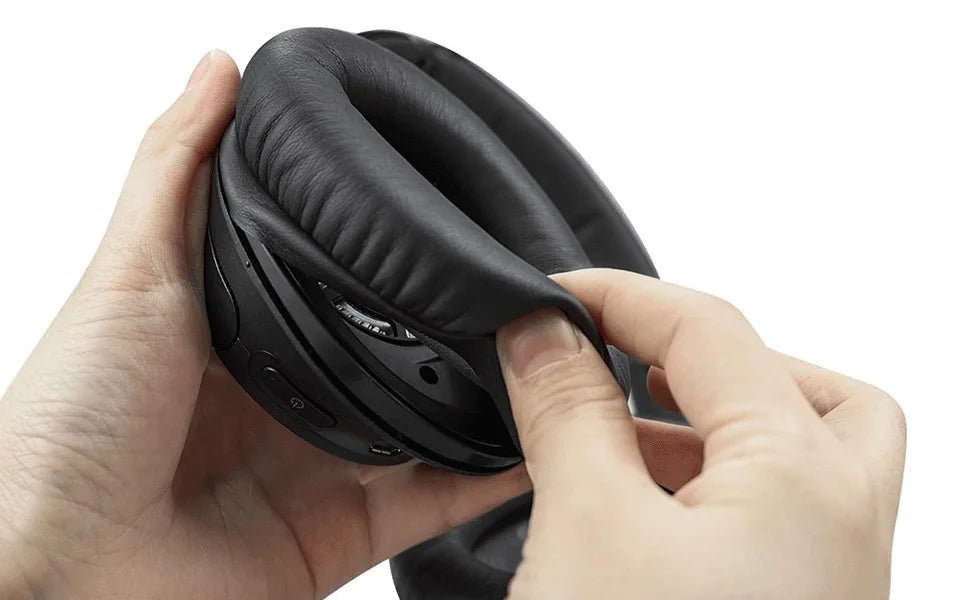 Close-up of a person replacing the ear pad cushion on Sony headphones with KUTOU ear pads.