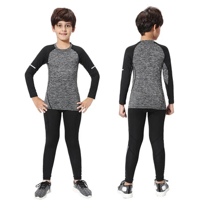 Kids winter thermal sports set, compression tights and top in gray and black for running, suitable for boys and unisex.