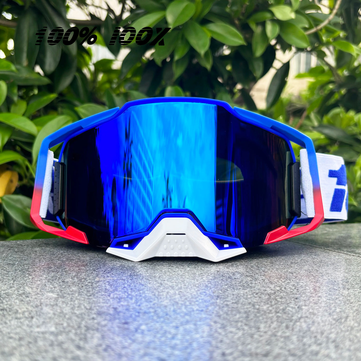 100% IOOX off-road MTB goggles with blue mirrored lenses, suitable for motorcycle and dirt bike racing, unisex eyewear.