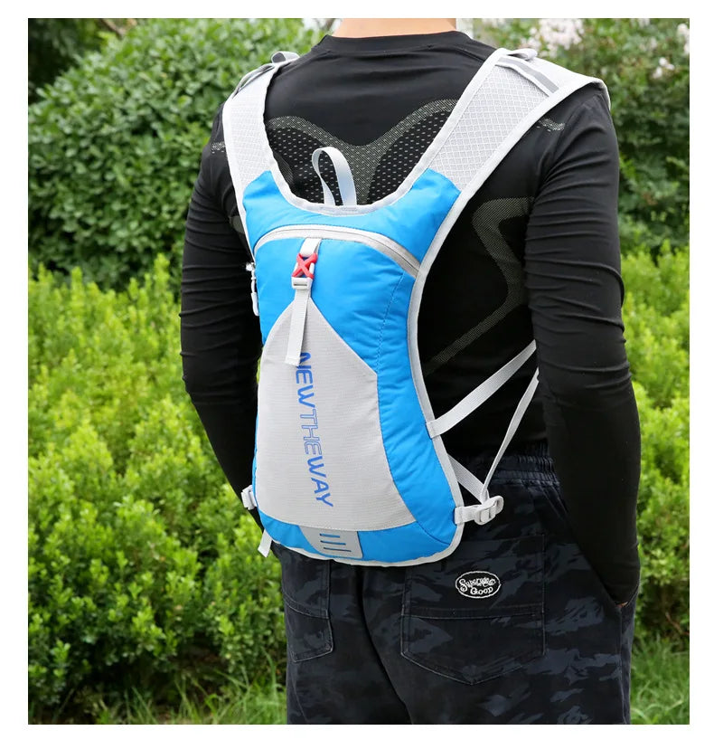 Ultralight waterproof hydration backpack in blue, ideal for outdoor running and cycling, worn on back.