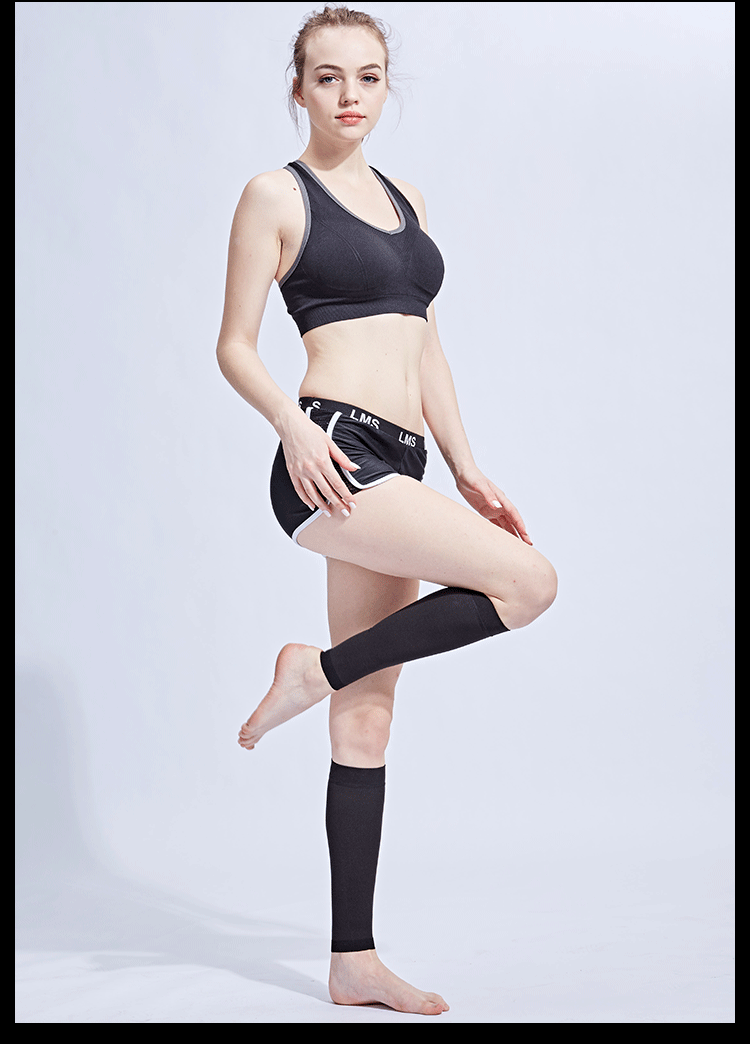 Model demonstrating footless compression calf socks in black, ideal for varicose veins and edema.