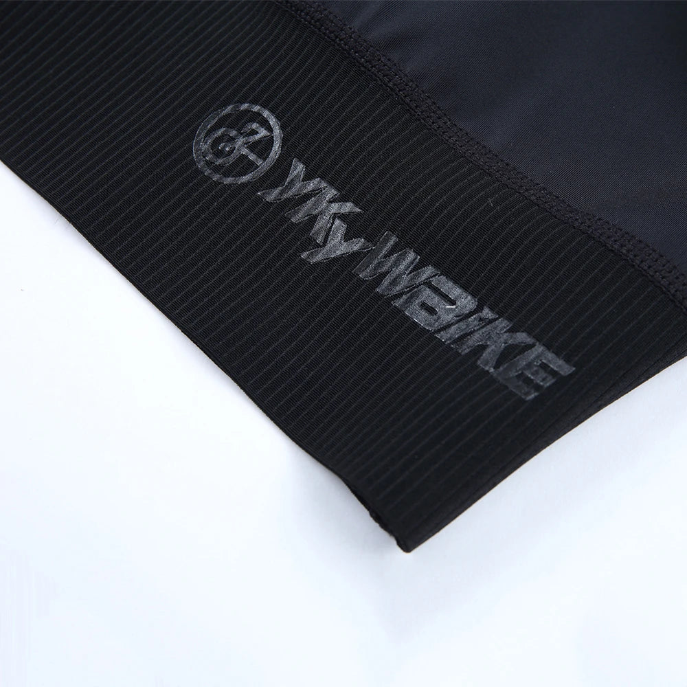 Close-up view of YKYWBIKE cycling bib shorts waistband showcasing logo and material texture.