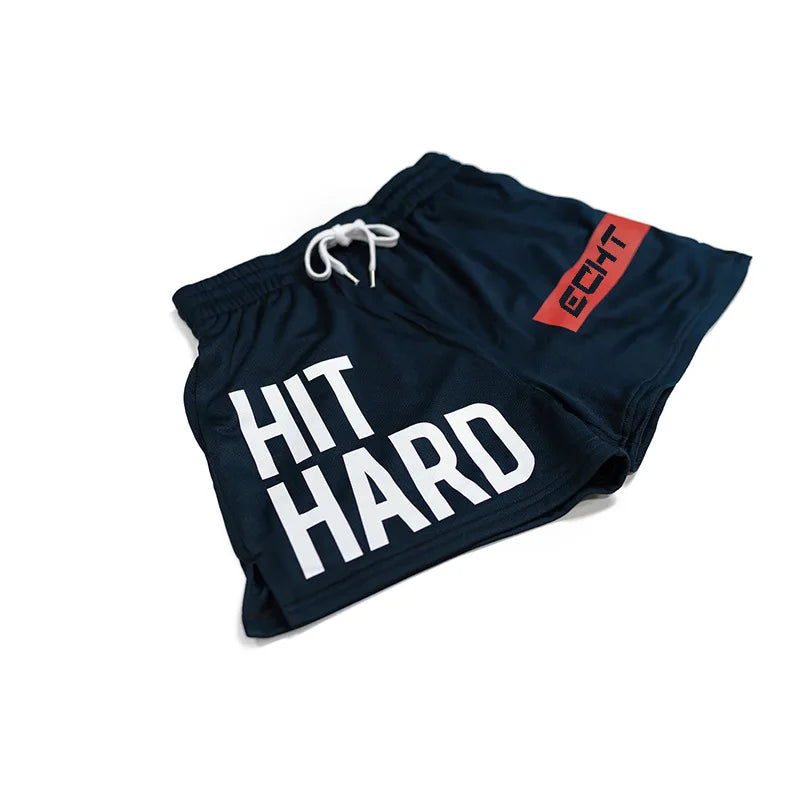 Men's breathable gym shorts featuring 'HIT HARD' print, lightweight mesh ideal for running and sports.