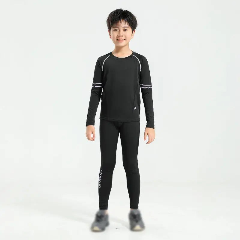 Boys' thermal compression sportswear set, quick-dry fabric ideal for basketball and soccer, perfect for young athletes.