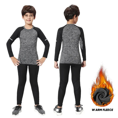 Kids thermal sports set featuring compression tights and long-sleeve top in gray and black for running and outdoor activities.