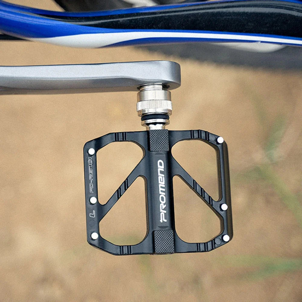 Lightweight non-slip bike pedal with durable steel design, ideal for road bicycles and BMX, featuring a ball bearing mechanism.
