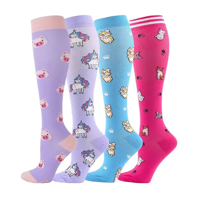 Four pairs of colorful compression socks featuring fun animal and unicorn designs, suitable for men and women.