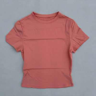 Women's short-sleeved quick-drying breathable sports T-shirt in coral color, perfect for yoga and fitness activities.