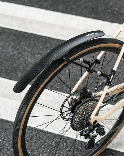 Bicycle mudguard soft PP plastic fender mounted on a road bike for enhanced protection against mud and debris.