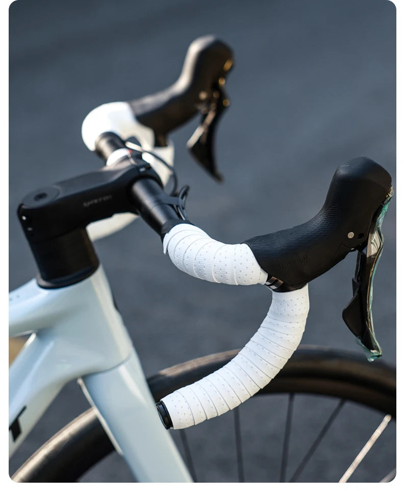 INBIKE Soft Grip Handlebar Tape in white, showcasing non-slip cushion on a bicycle handlebar for comfort and control.