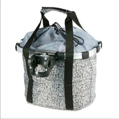 Bike front basket pet carrier with handlebar attachment, foldable design, made of durable polyester.