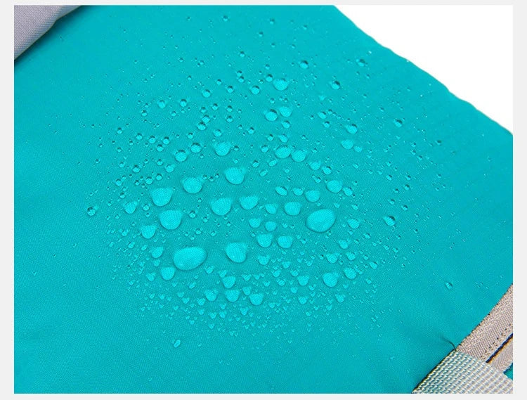 Close-up of ultralight waterproof hydration backpack showing water droplets on the fabric.