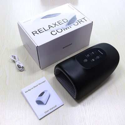 Electric hand massage device with airbag compression, heat therapy, and deep kneading features on a table.