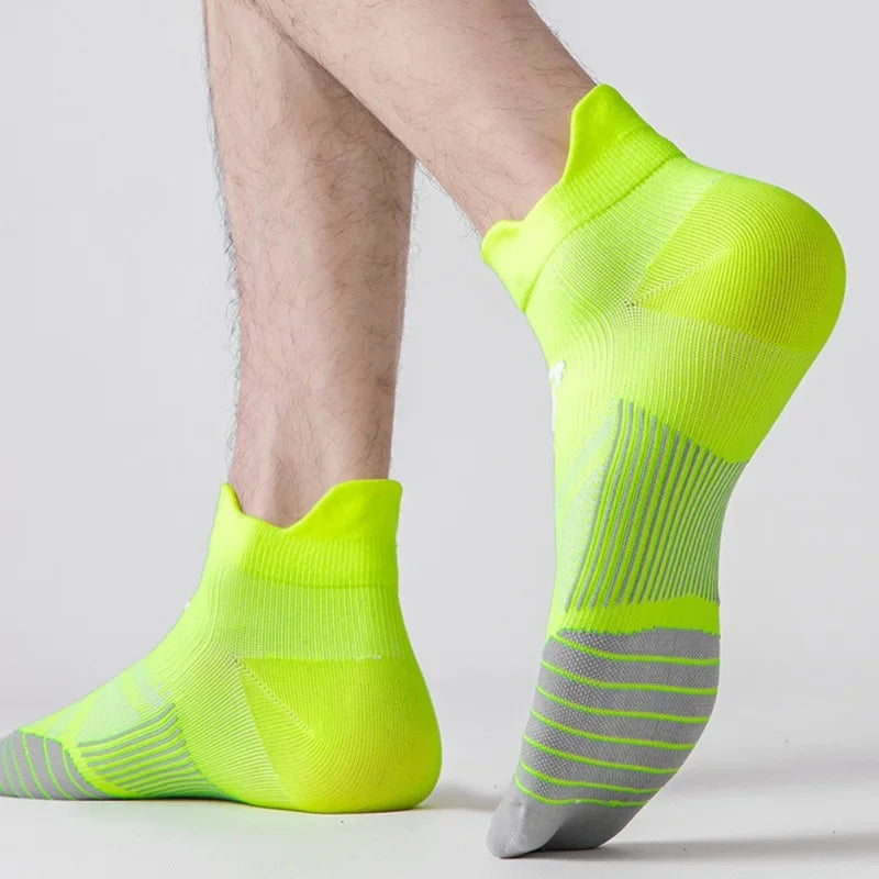 Breathable bright yellow sports socks for men and women, perfect for running and fitness workouts.