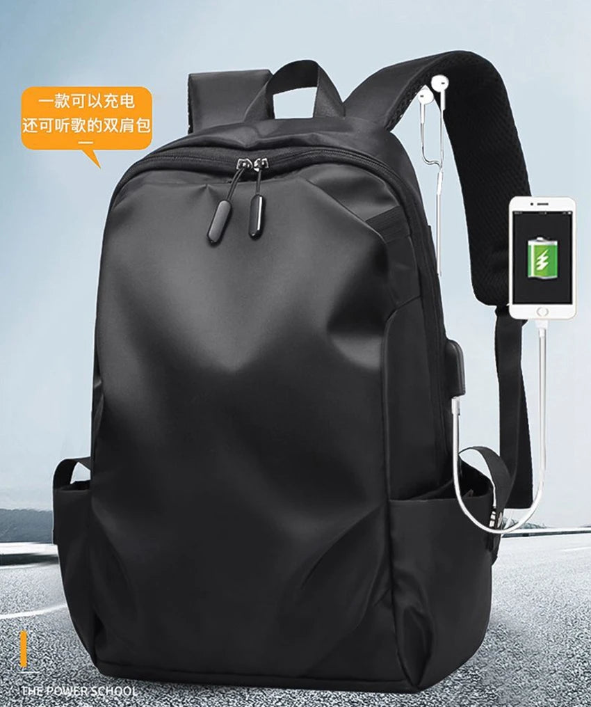 Black USB charging backpack for students, unisex design, ideal for college and outdoor activities, soft handle and durable fabric.