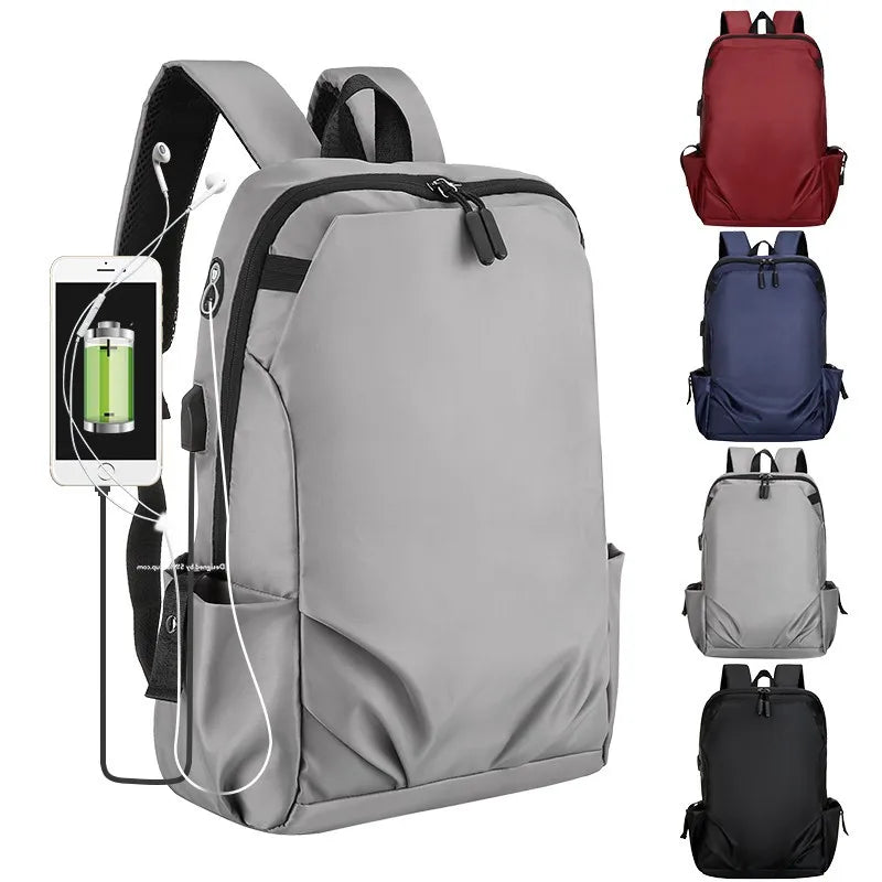 Grey unisex laptop backpack with USB charging port, available in multiple colors for students and professionals.