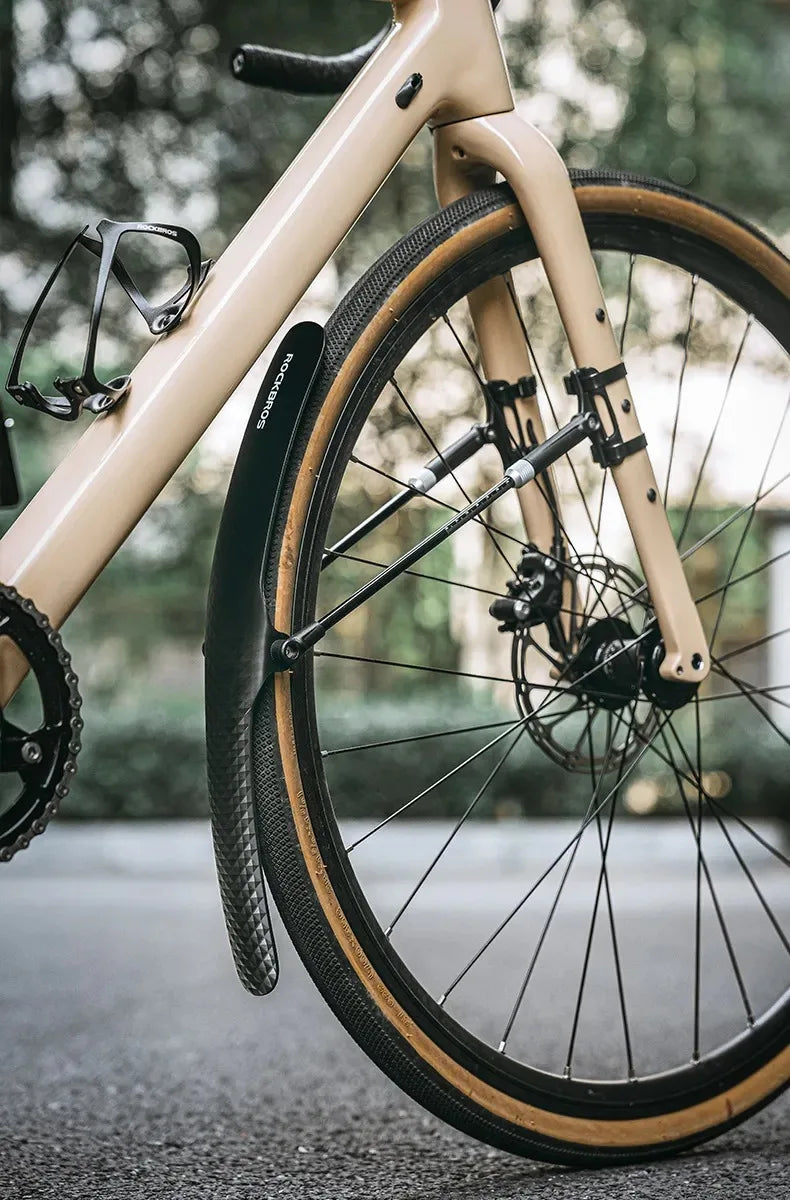 Bicycle with a soft PP plastic rear mudguard fender for enhanced protection on road bikes.