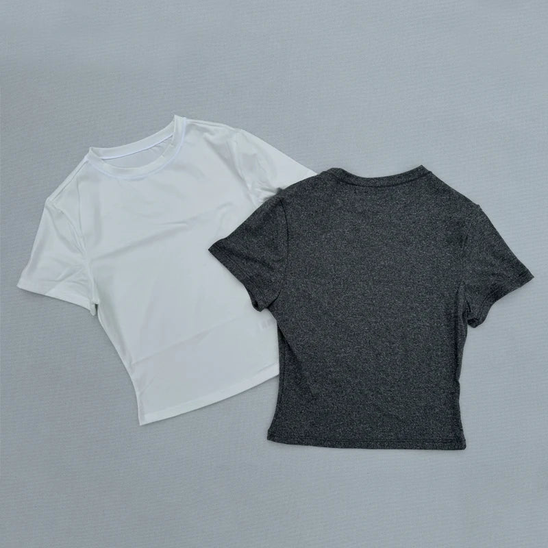 White and gray women's short sleeved sports T-shirts, quick drying and breathable fabric for yoga and fitness.
