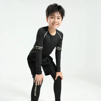 Boys' thermal compression sportswear set in black, perfect for basketball and soccer, designed for comfort and quick-dry performance.