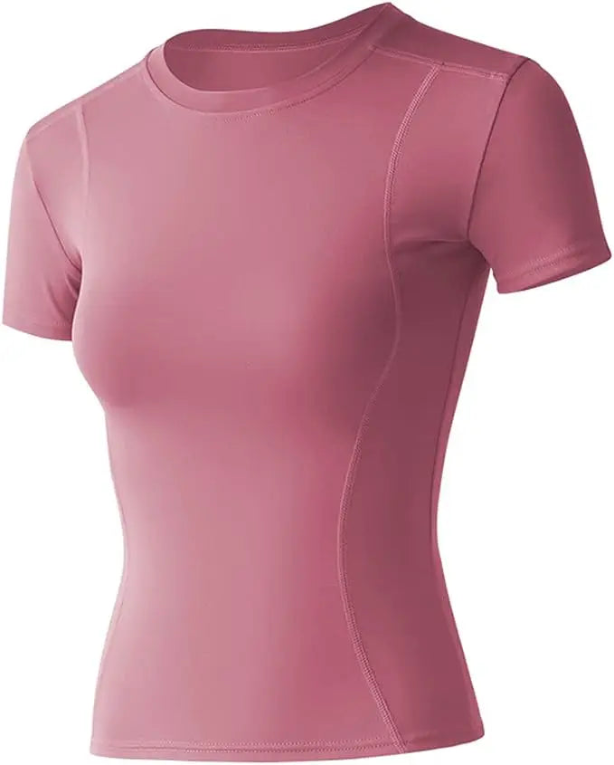 Women's short sleeve workout top in pink, breathable nylon fabric for yoga and athletic activities.